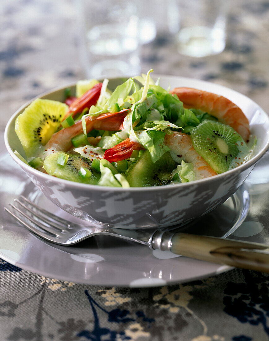 Fresh salad with kiwis