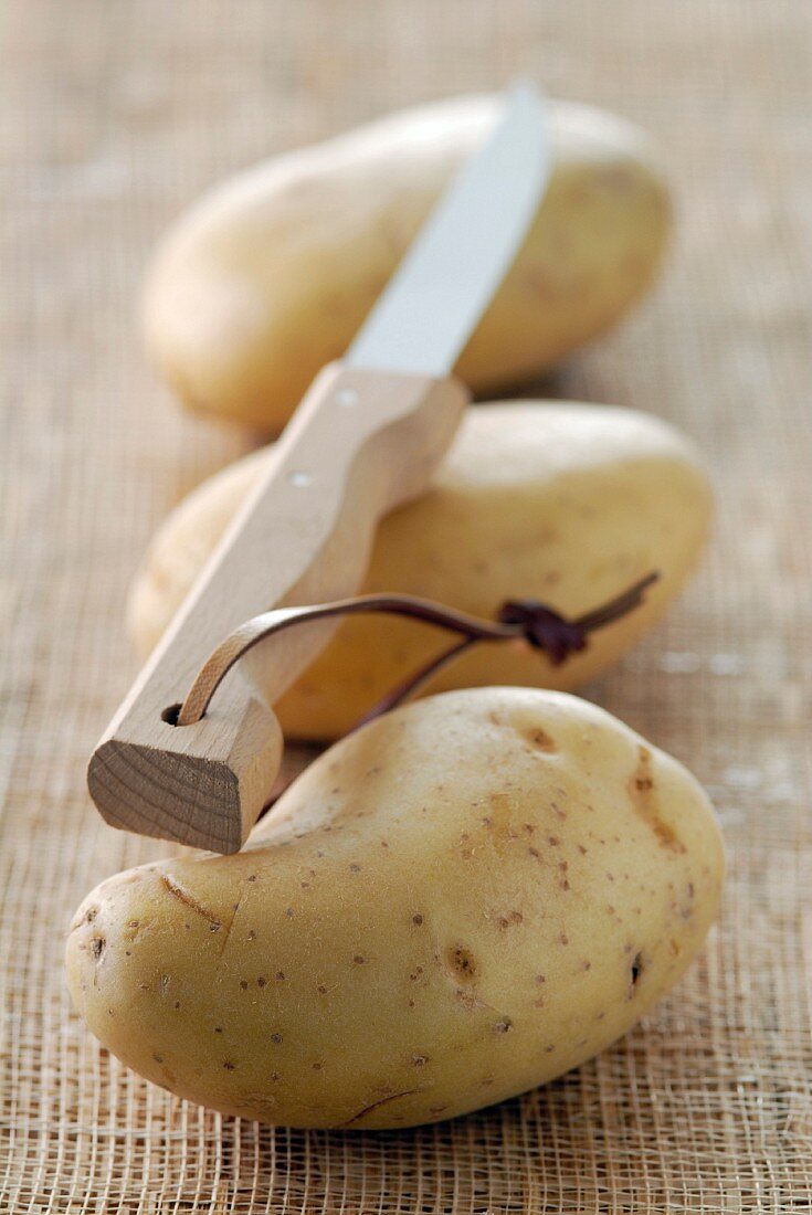 Potatoes and knife