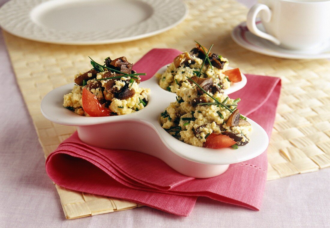 Scrambled eggs with mushrooms and chives