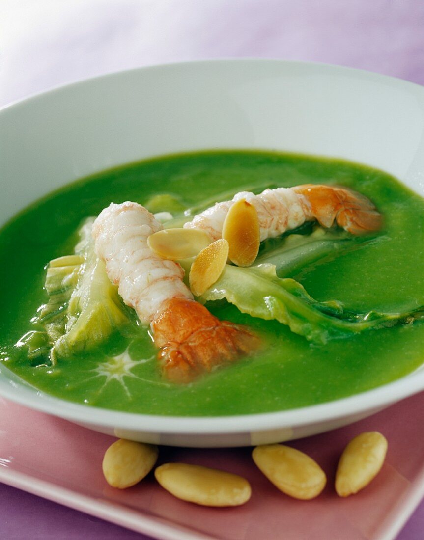 Cream of lettuce soup with langoustines