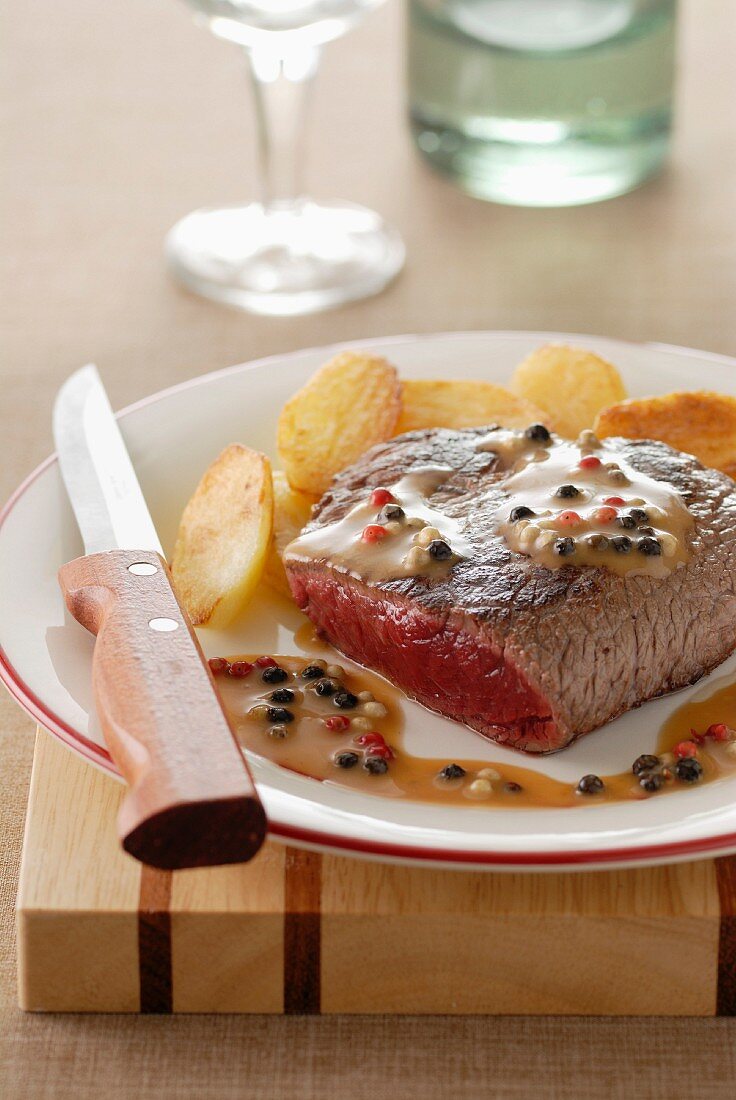 Thick beef steak with pepper sauce