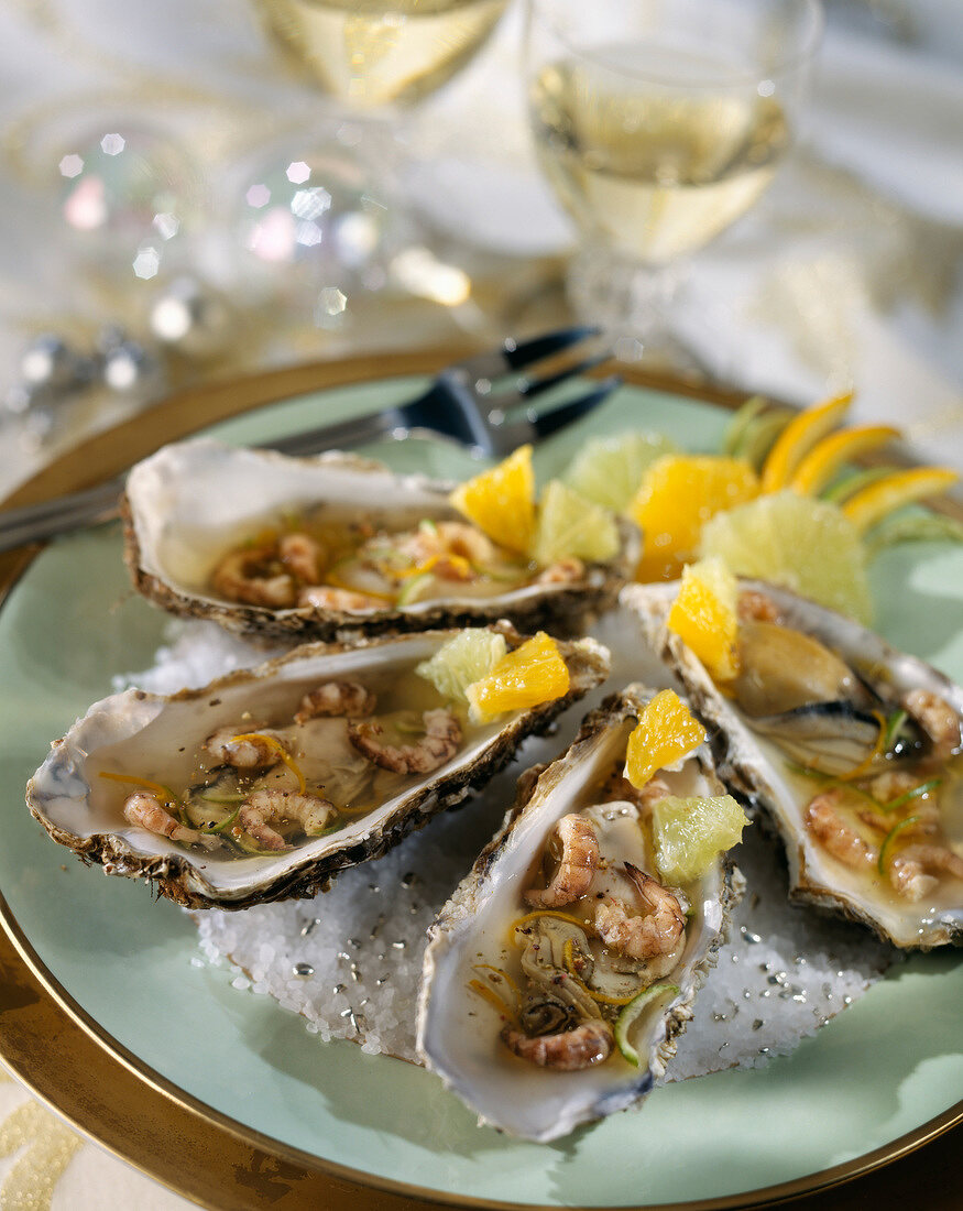 Oysters with brown shrimps and citrus fruit