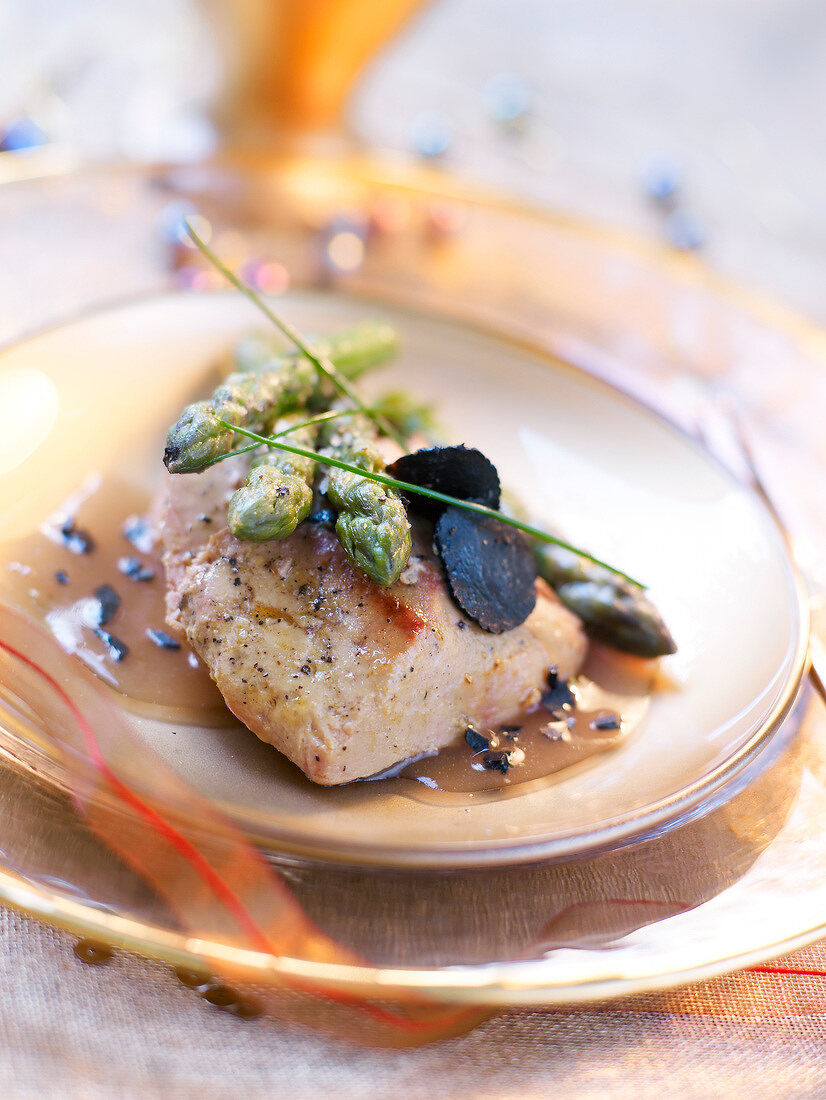 Pan-fried foie gras with truffles and green asparagus