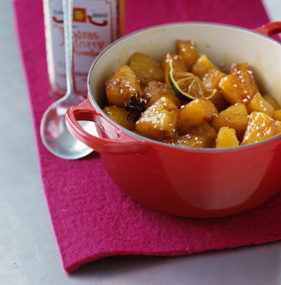 Pineapple and mango confit with honey and curry