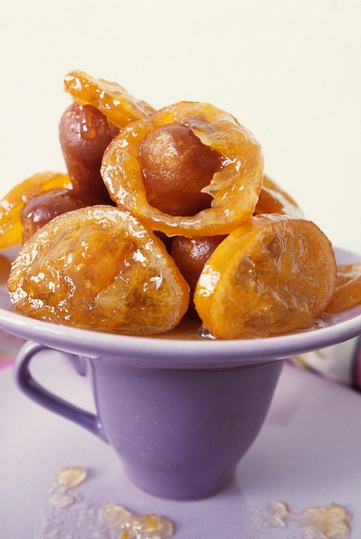 Babas with rum and confit oranges