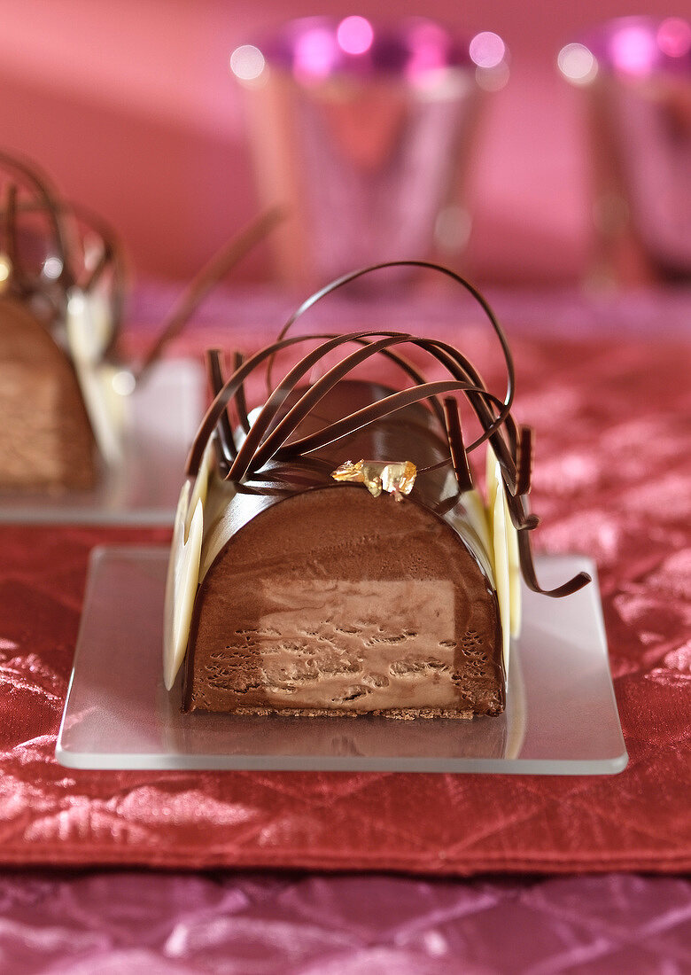 Three chocolate Christmas iced log cake