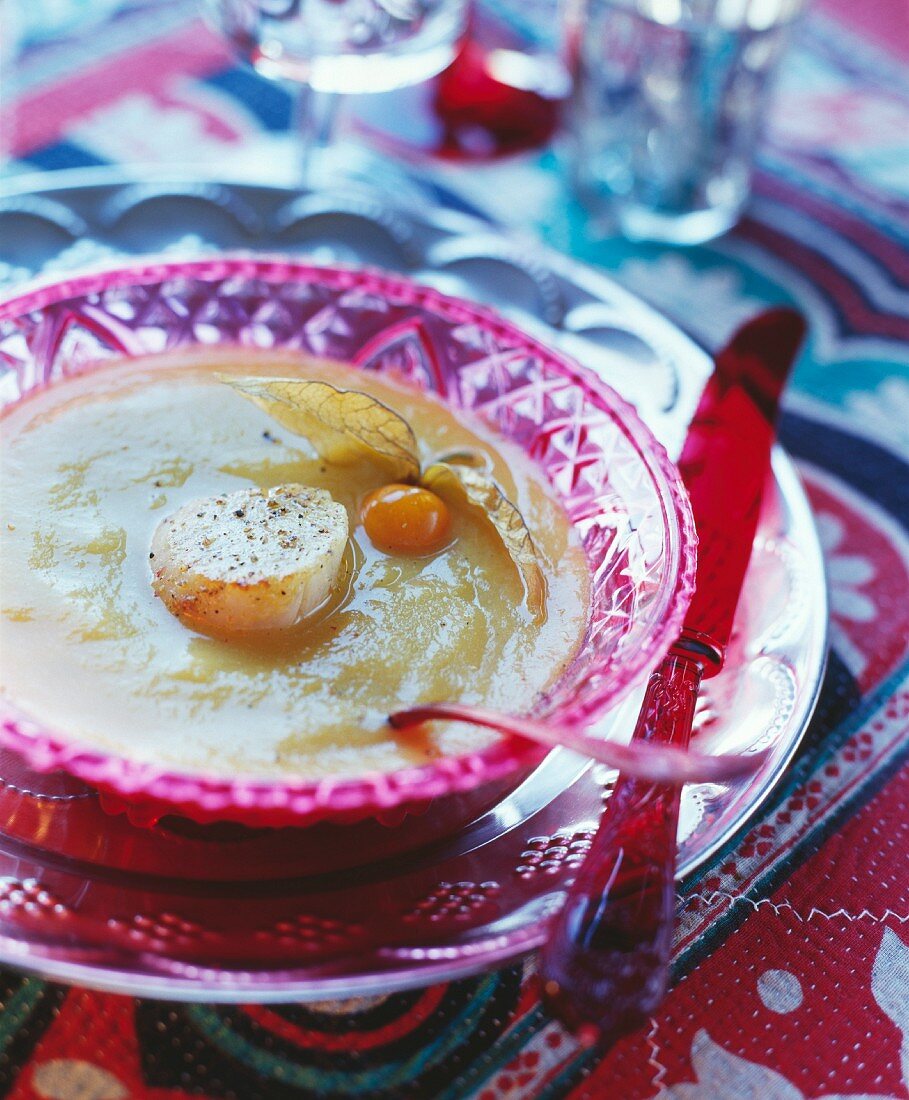 Artichoke and pumpkin soup with scallops