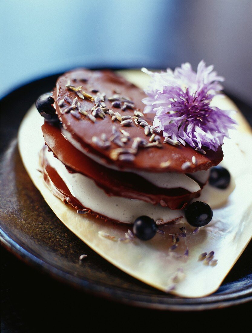 A layered cake with lavender chocolate