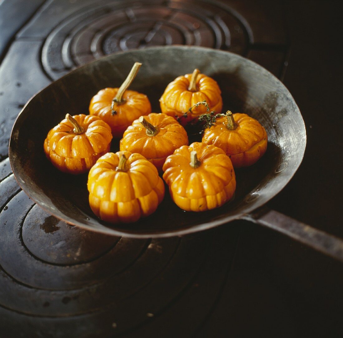 Mini pumpkins in a pan