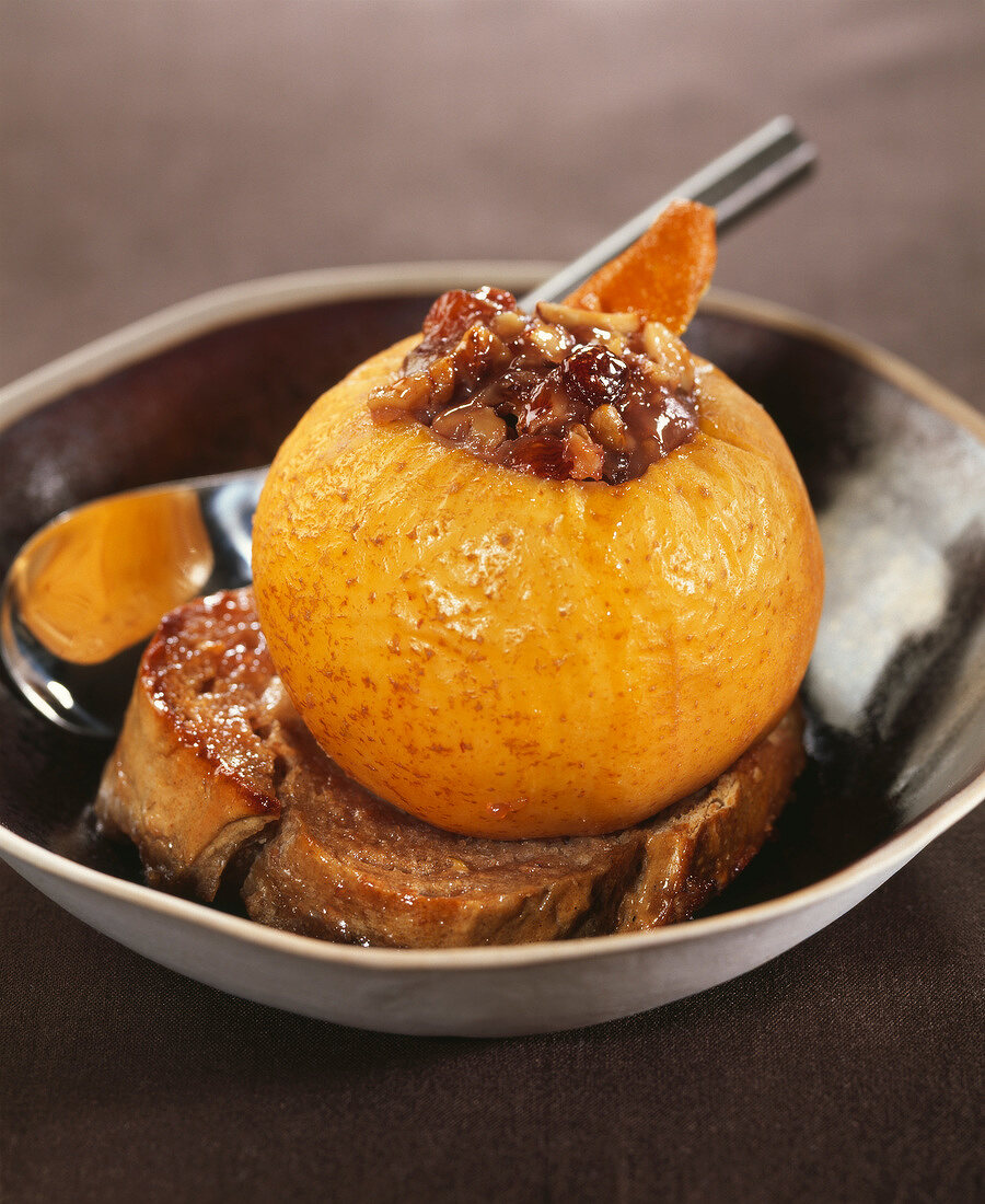 Baked apple stuffed with dried fruit