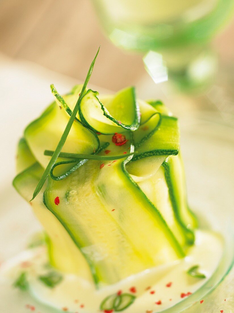 Courgette timbale with a pepper sauce