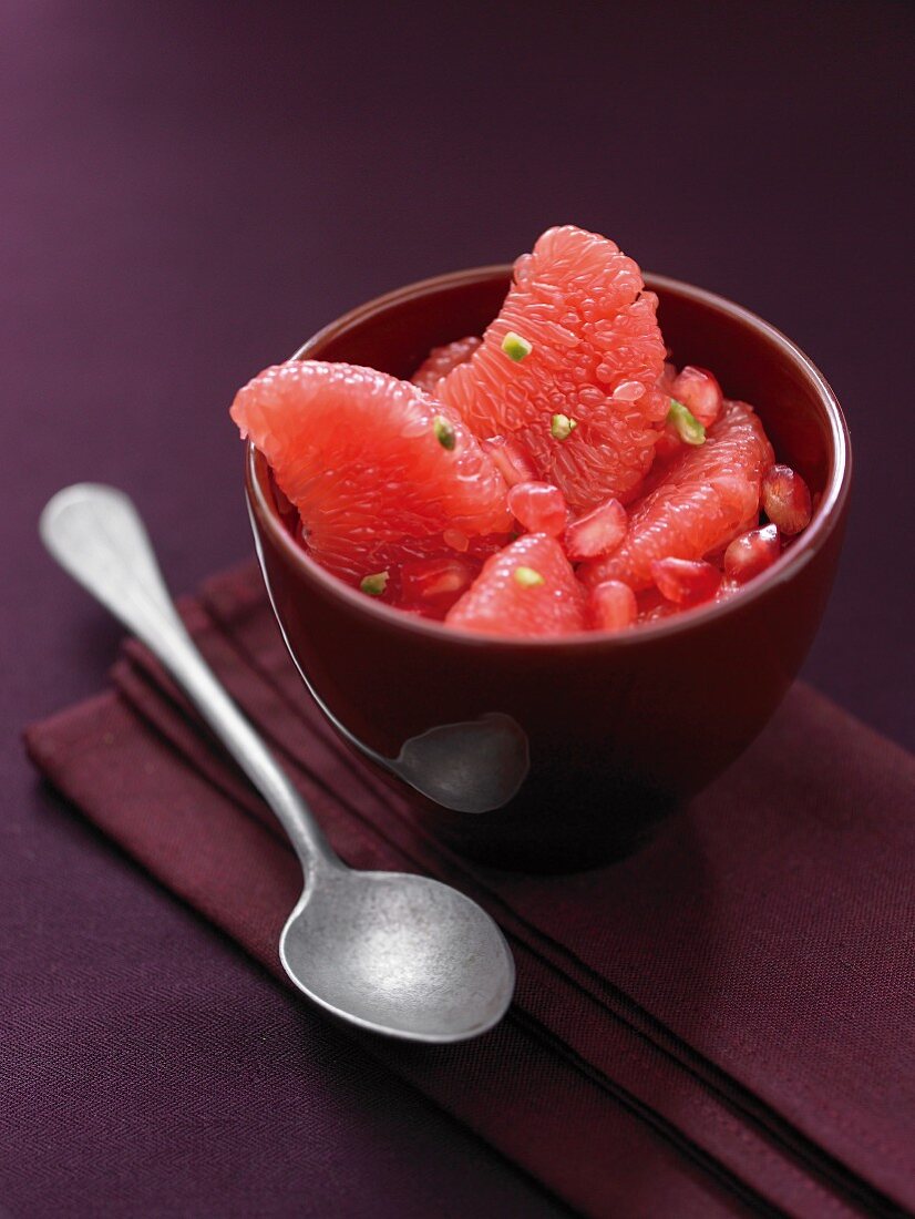 Fruit salad with grapefruit, pomegranate and pistachios