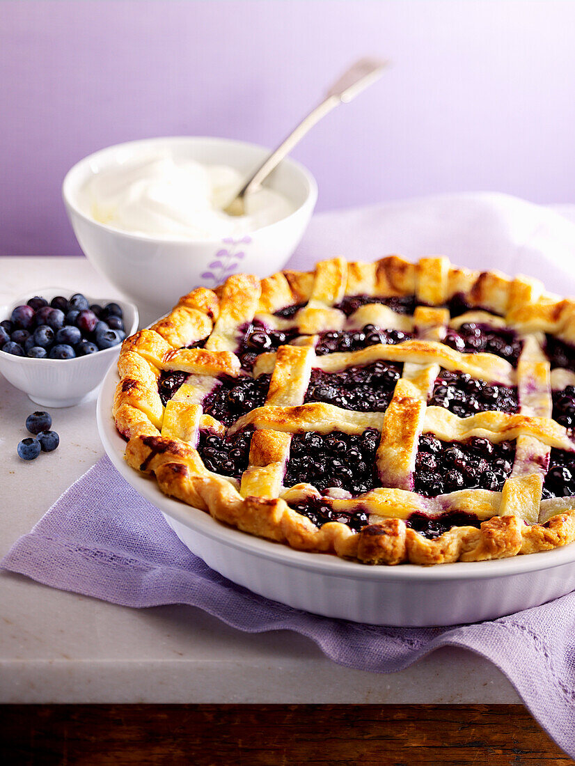 Bilberry pie with cream