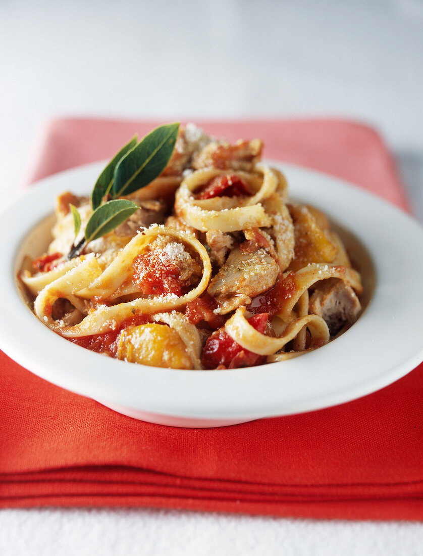 Tagliatelles with tuna,peppers and basil sauce