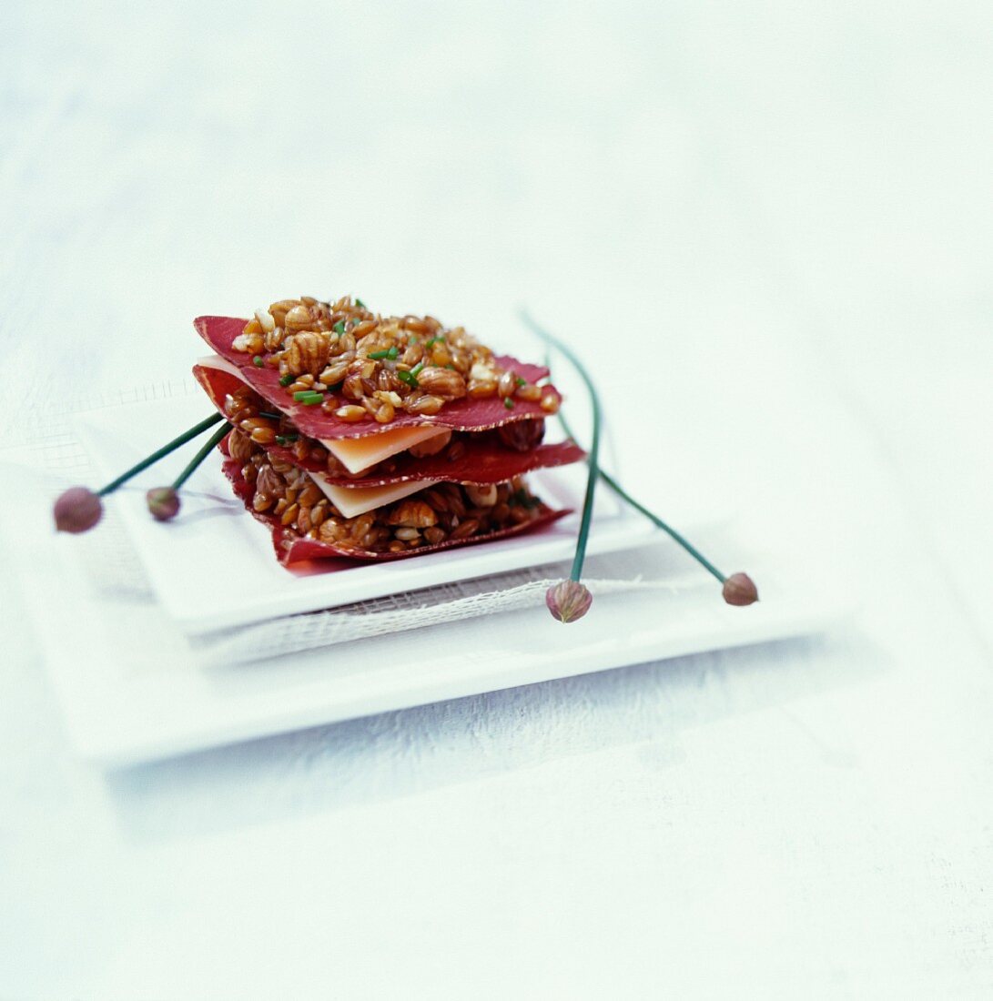 Mille feuille made from Grissons air-dried beef, Beaufort cheese and spelt