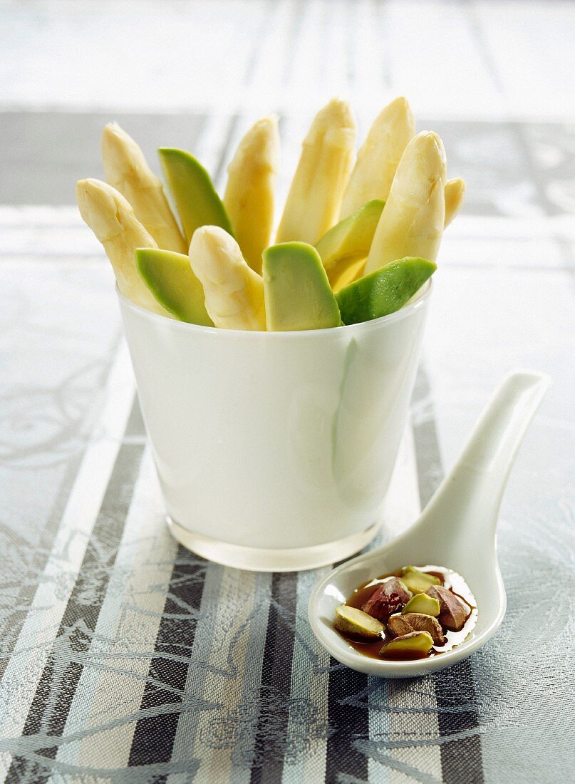 Avocado sticks and asparagus spears served with a grilled pistachio vinaigrette