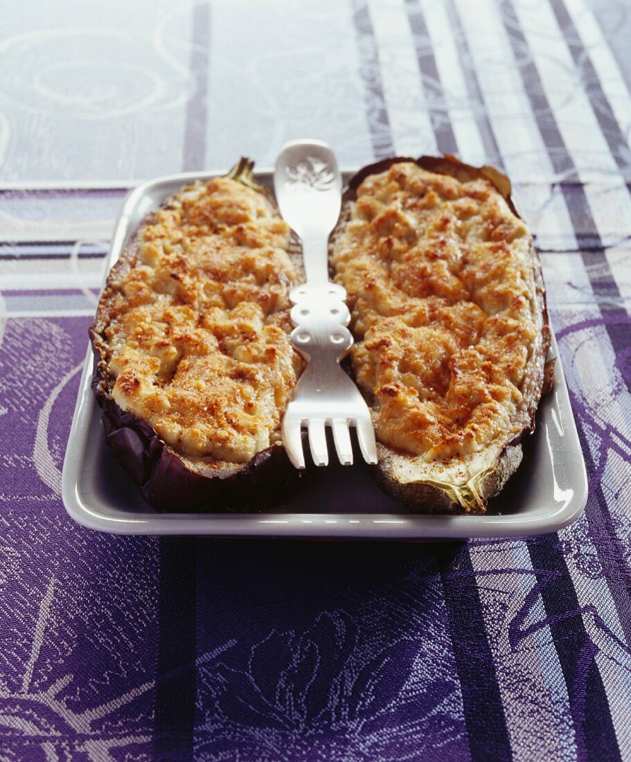 Gratinated aubergine with almond cream and anchovies
