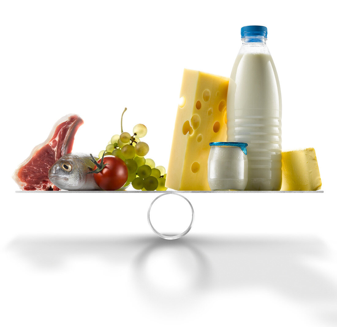 Selection of fresh products against dairy products on scales