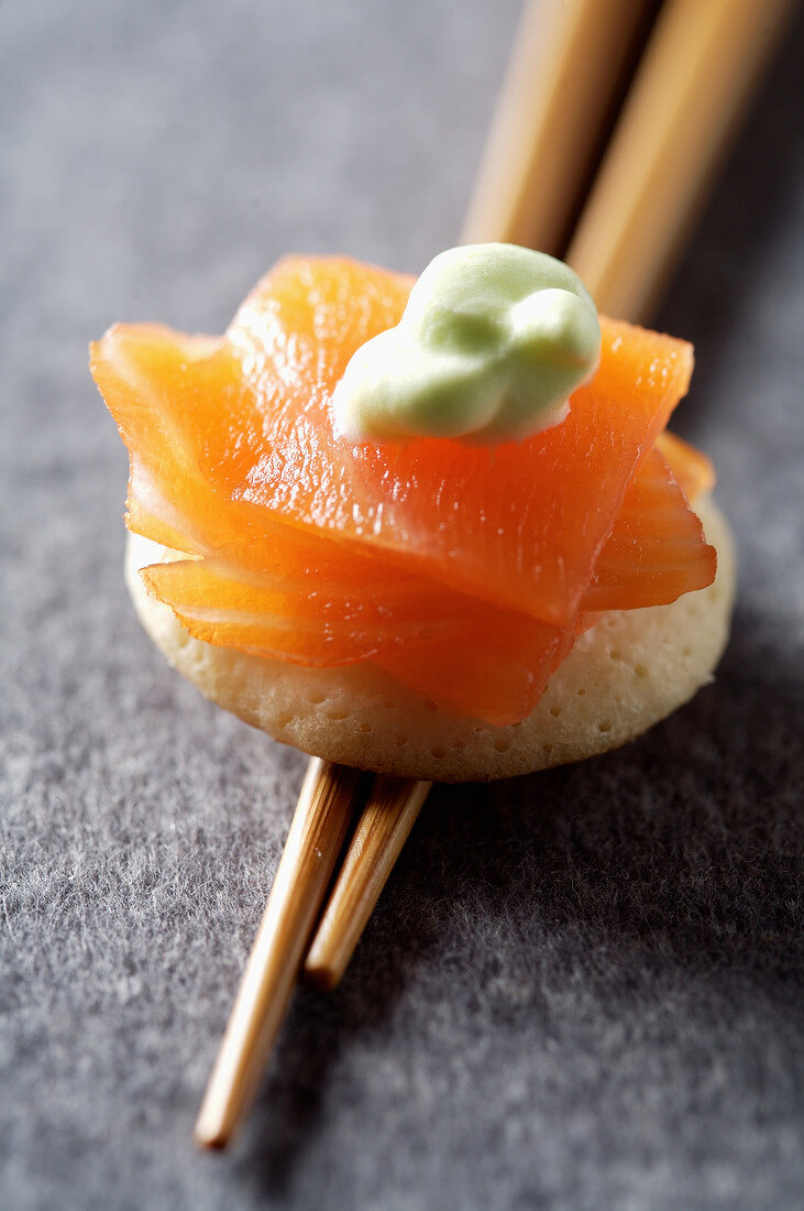 Mini blini with smoked salmon and wasabi