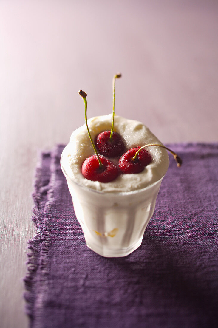 Whipped cream and cherries