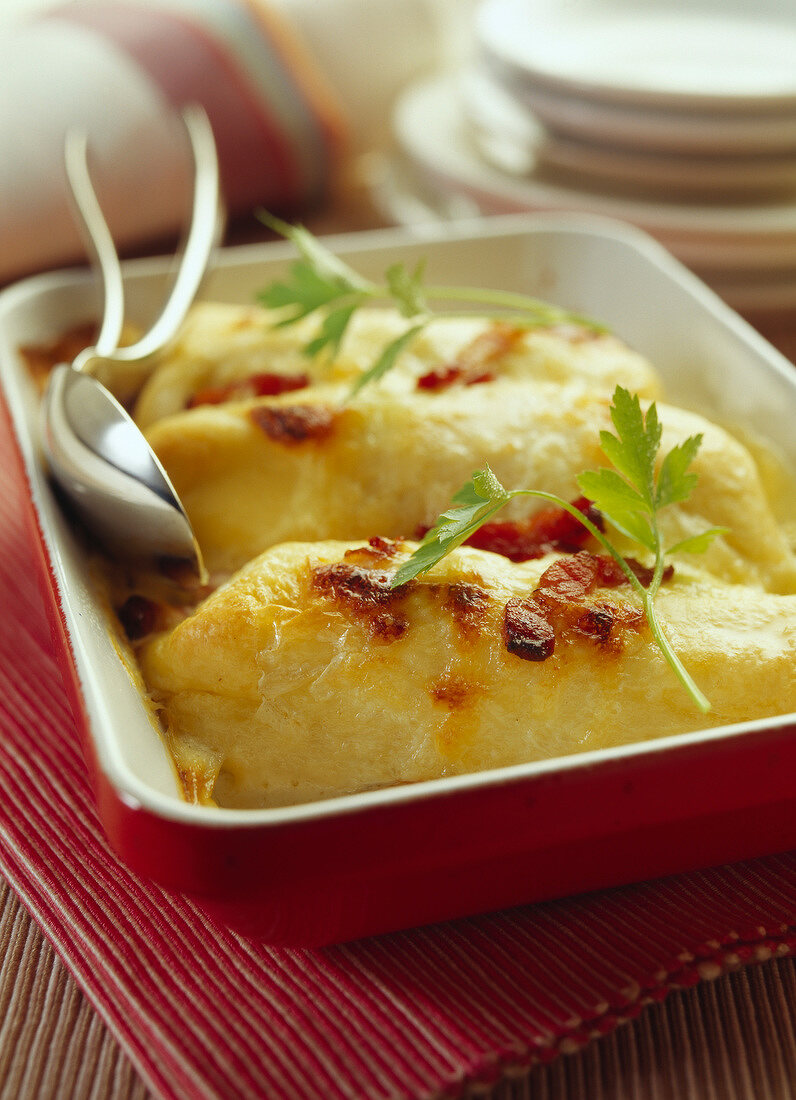 Cheese-topped Quenelle dish