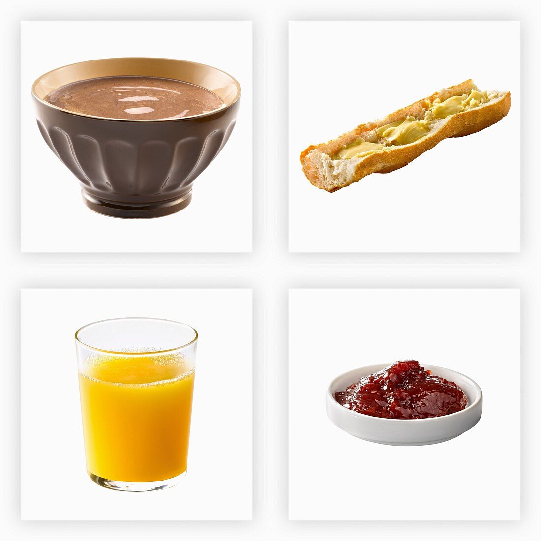 Französisches Frühstück: Kakao, Baguette mit Butter, Orangensaft, Konfitüre