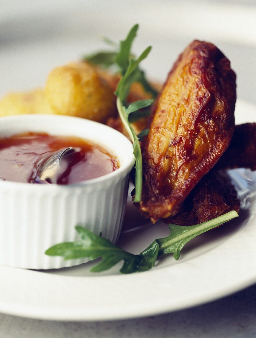 Fisch-Beignet mit süß-saurer Sauce