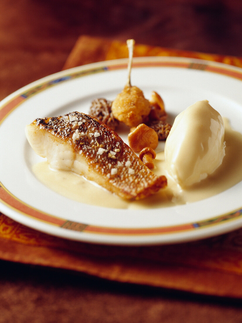 Roast pike and quenelle in white butter sauce