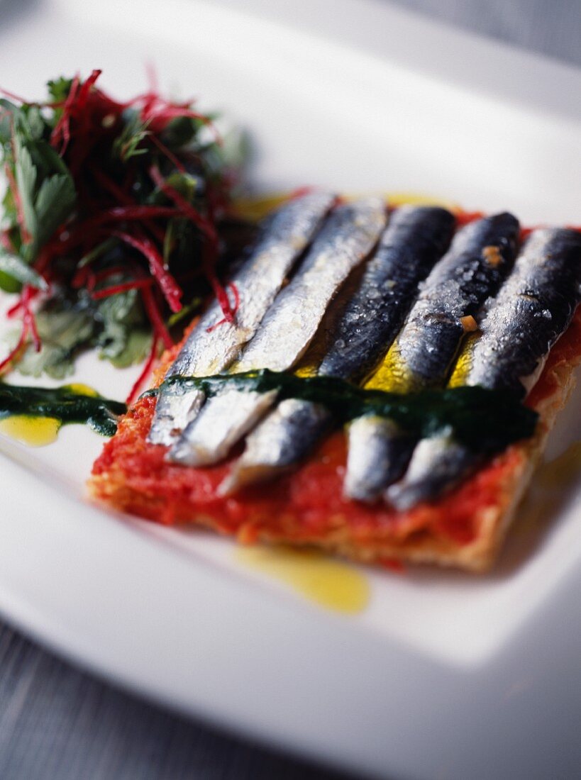 Marinated sardine and tomato tartlet