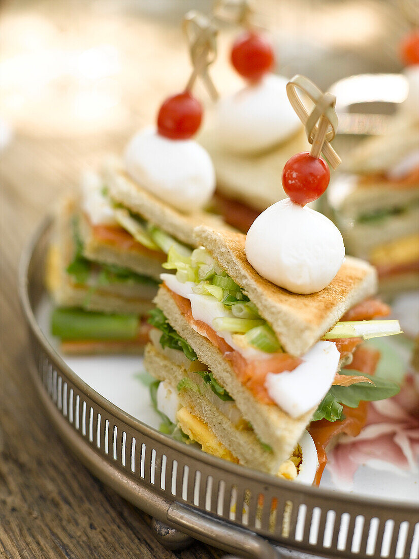 Smoked salmon club sandwiches