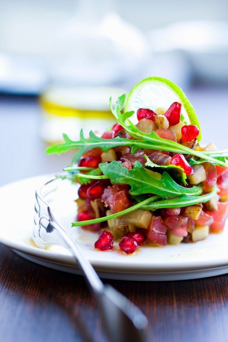 Tuna Tartare with pomegranate seeds and eggplant