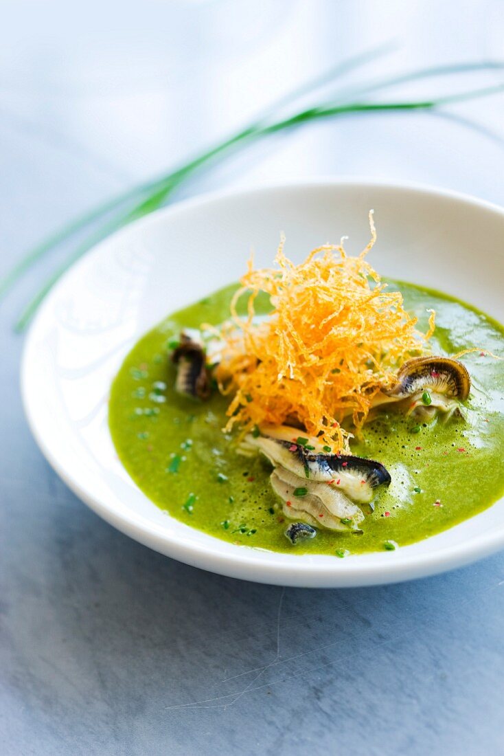 Cream of sorrel soup with oysters and watercress