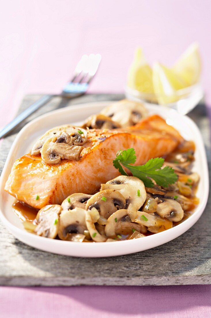 Piece of salmon with button mushrooms