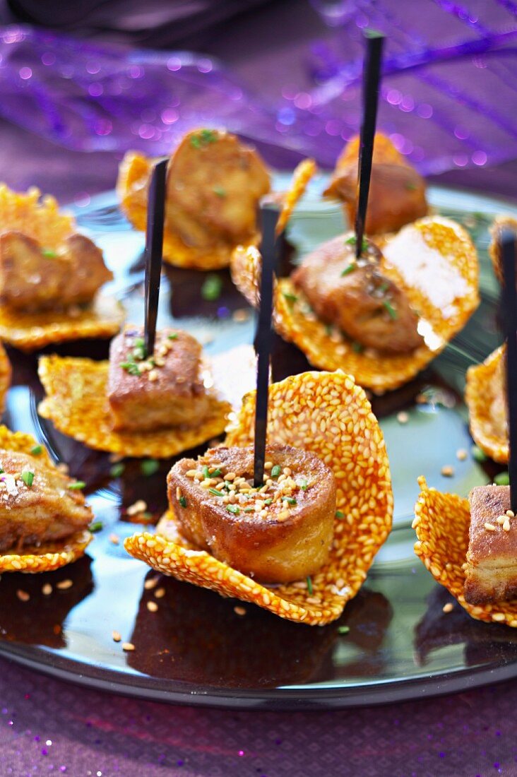 Nougatine tuile biscuits with pan-fried Foie-gras cubes