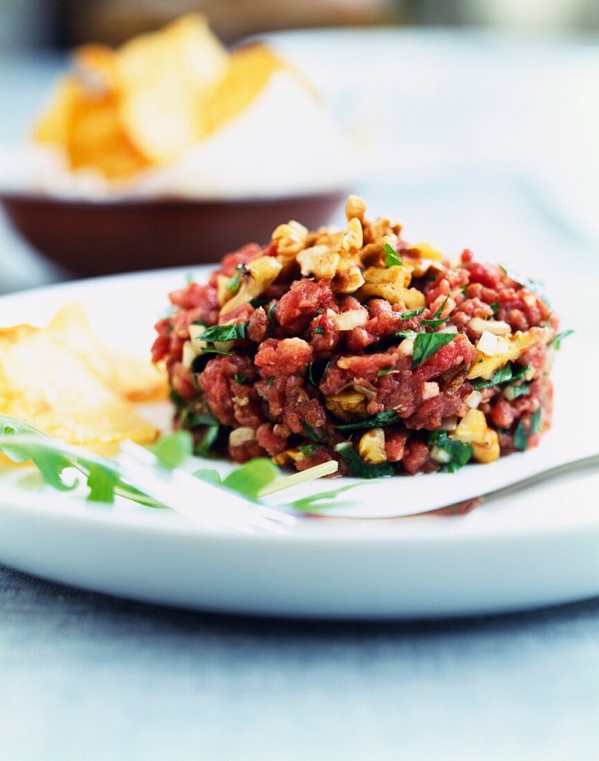 Beef tartare with crushed walnuts
