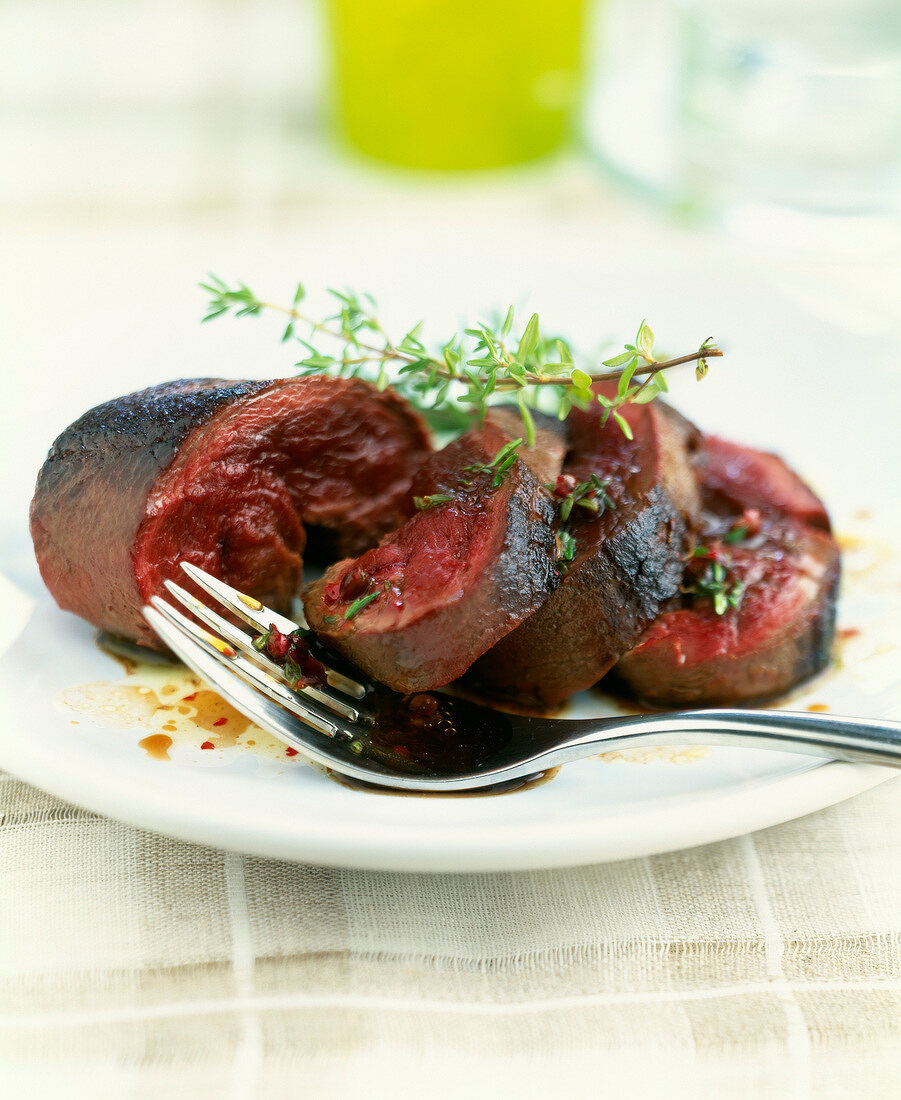 Heart of ostrich cooked rare with old wine vinegar