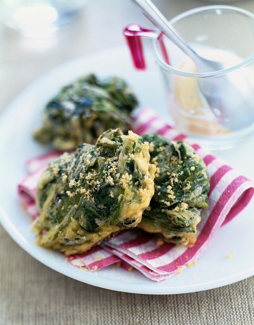 Spinach fritters with brown sugar