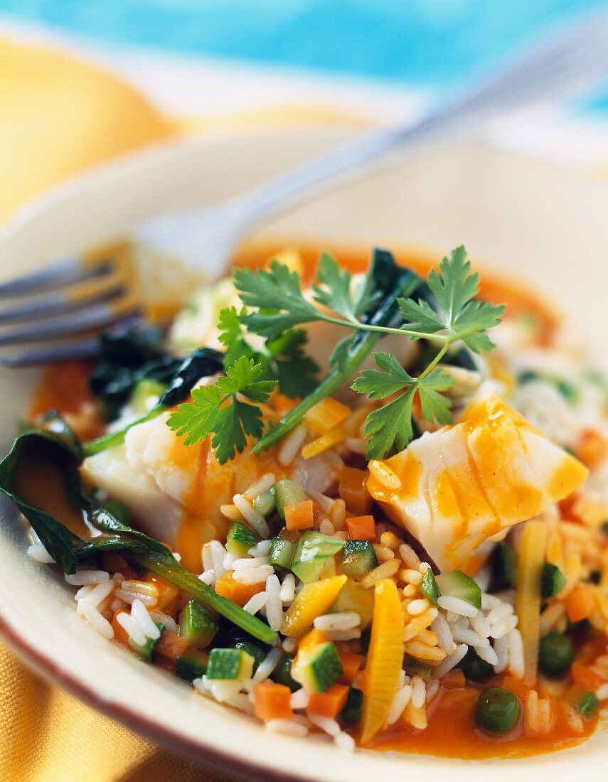 Cod with two citrus fruit and rice with vegetables