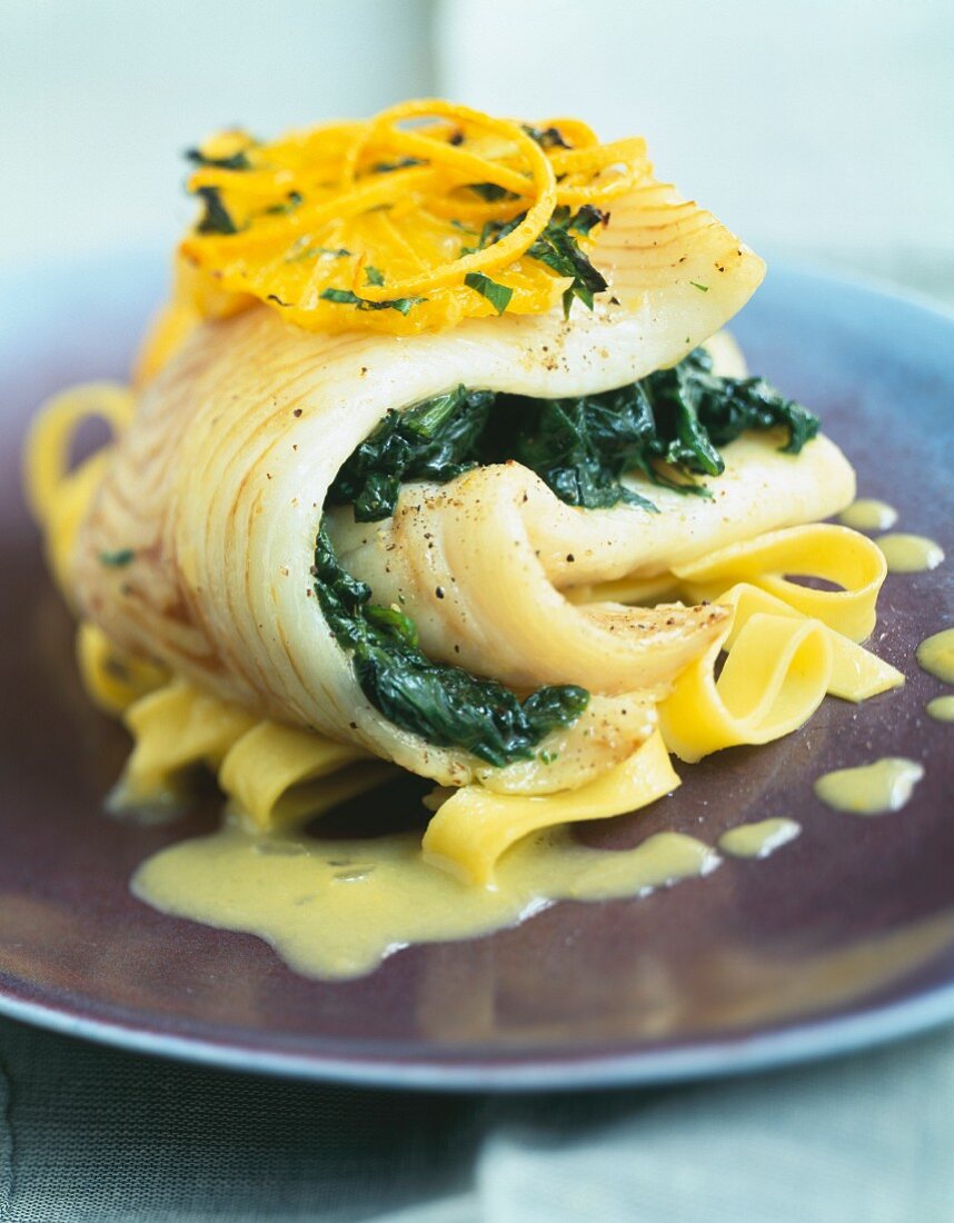 Halibut with spinach and orange sauce