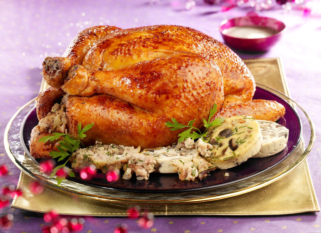 Roast capon with white sausage stuffing