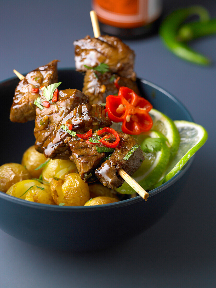 Thai-style marinated beef skewers with Grenaille potatoes
