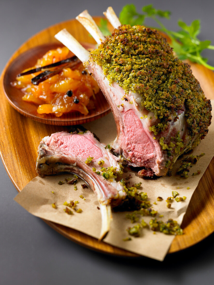 Loin of lamb in spicy crust,apricot and saffron chutney