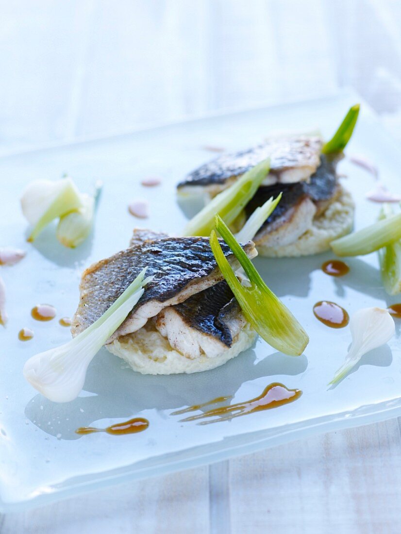 Sea bream fillets with risotto and parmesan