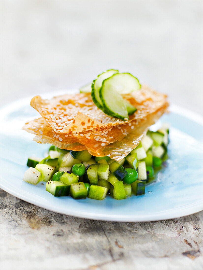 Green tomato and cucumber Tartare,crunchy sesame seed filo pastry sheets