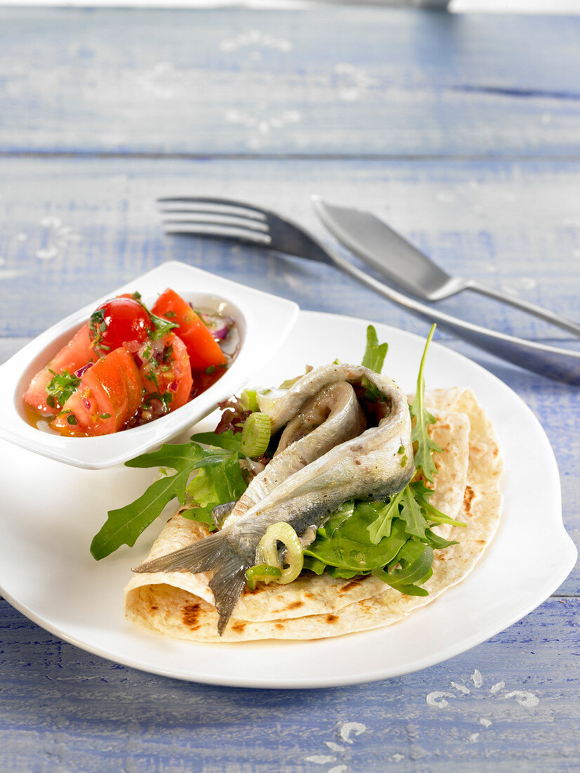 Marinated sardine Tortilla with tomato salad