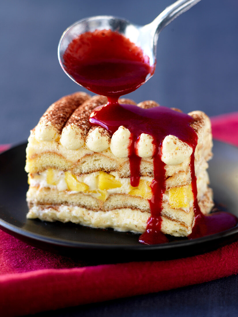 Tiramisu coated with summer fruit puree