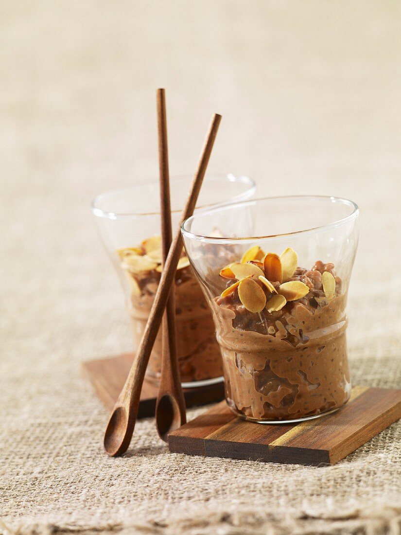 Chocolate rice pudding with thinly sliced grilled almonds