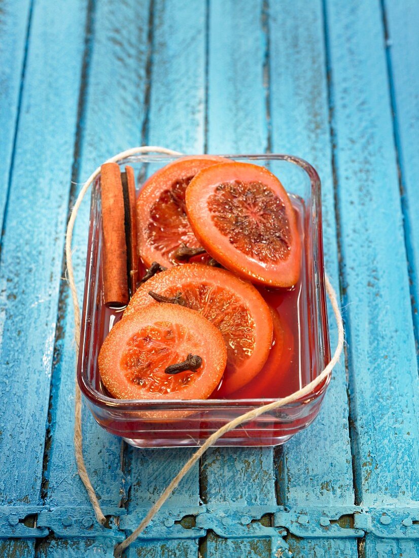 Sliced blood oranges with cloves and spices