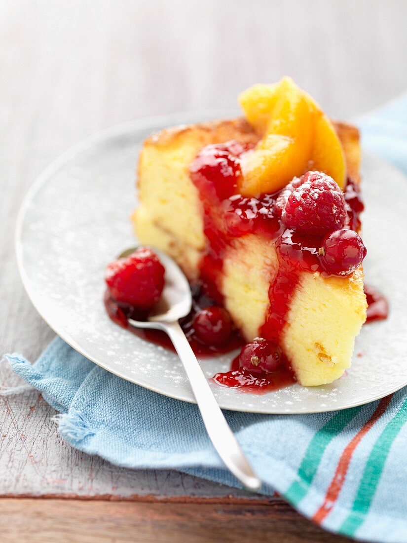Soft cake with stewed summer fruit