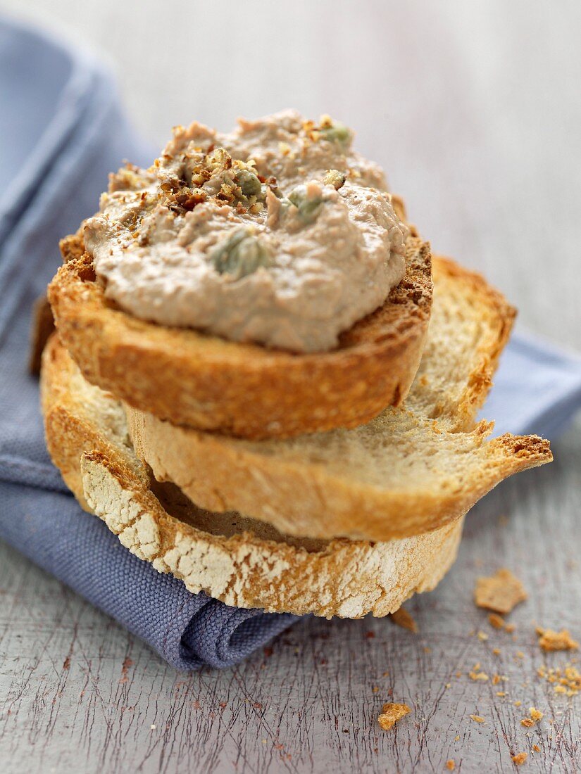 Chicken liver paté with capers on toast
